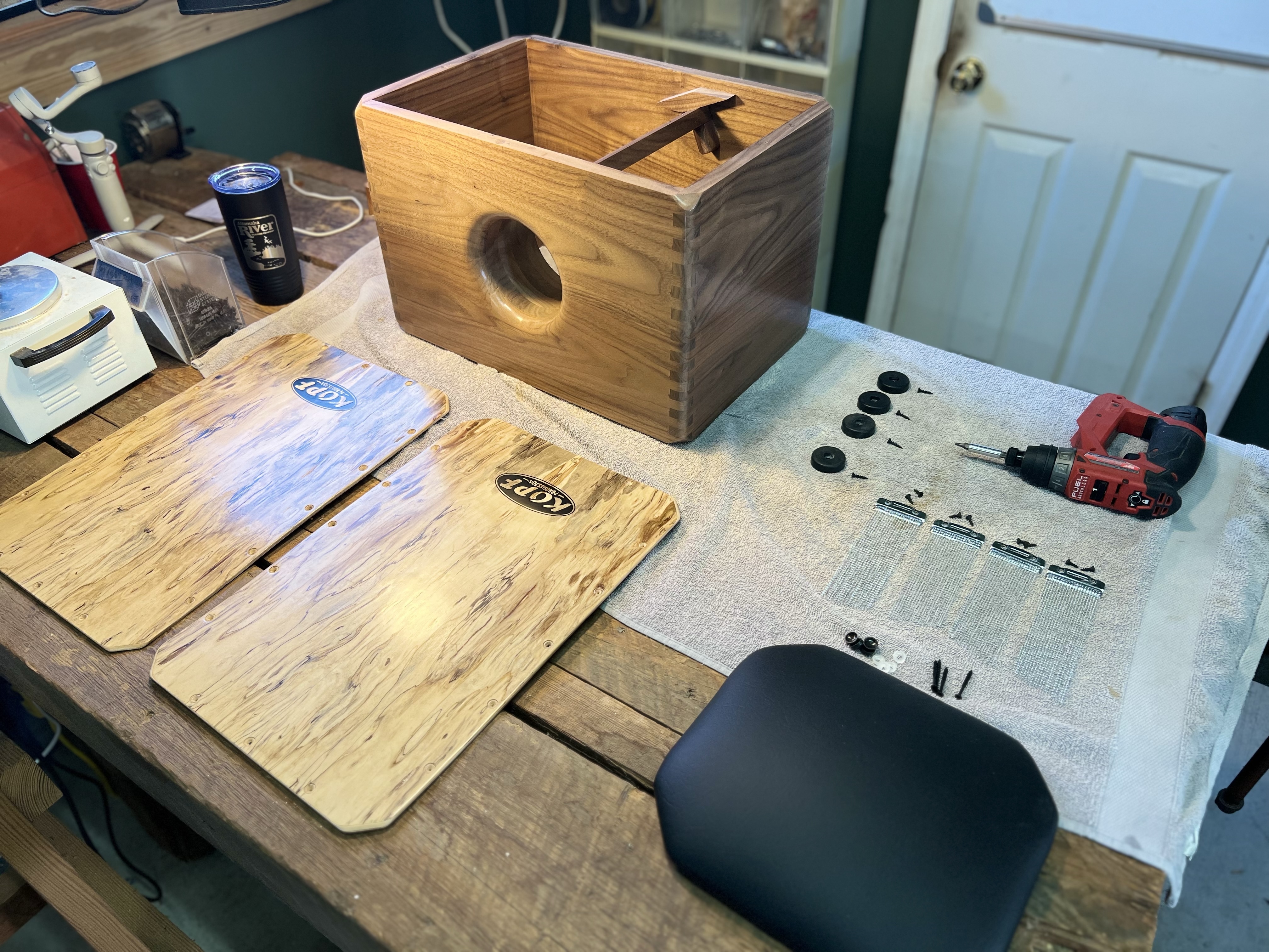 All the parts layed out for a tonewood cajon assembly, including a fixed snare system. Kopf Percussion