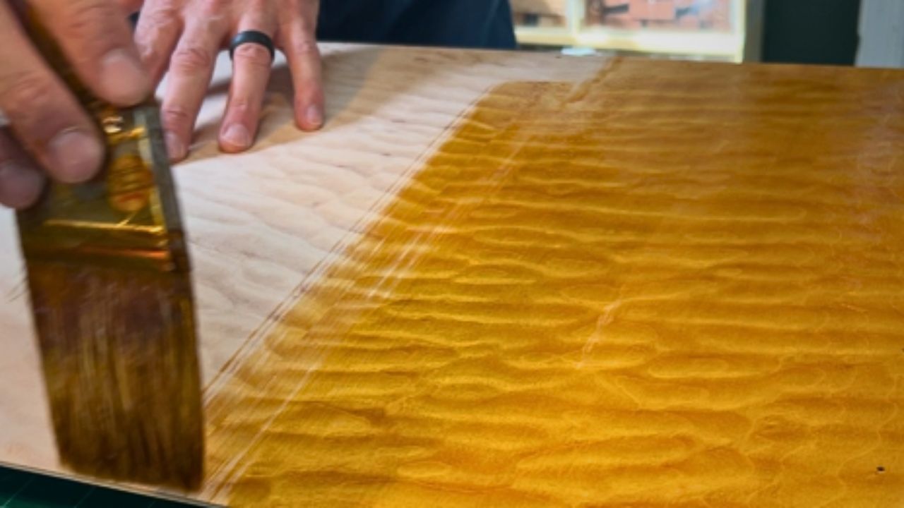 Stephen Head applies a hand-brushed shellac finish to a handcrafted cajon at Kopf Percussion. The process highlights how traditional materials remain essential because they work — offering control, clarity, and a natural feel that modern finishes can’t replicate.