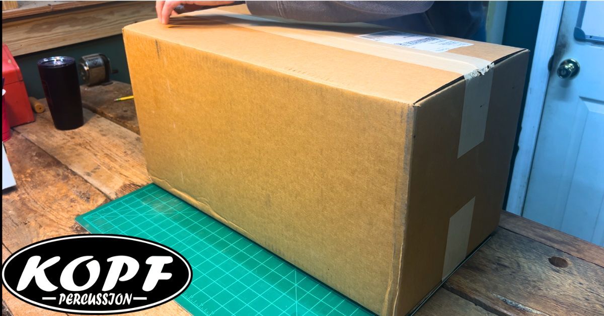 Finished handcrafted cajon boxed and prepared for shipment at Kopf Percussion.