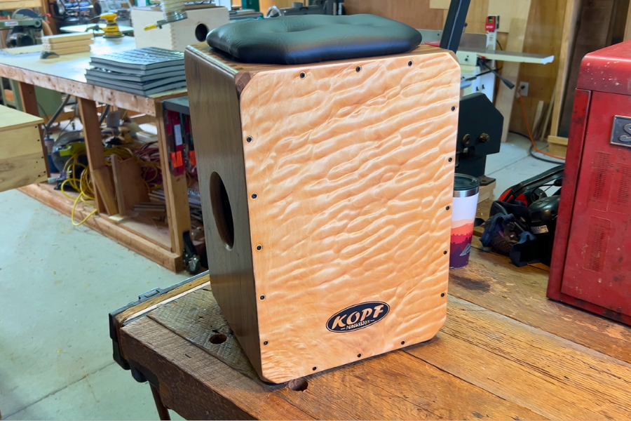 Curly maple cajon faceplate paired with hardwood body for balanced tone.