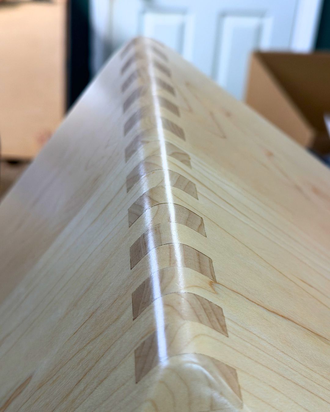 Hard maple cajon body showing box joint corner construction during the build process